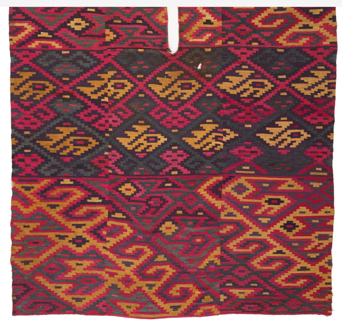 Colorful poncho with bird and geometric designs