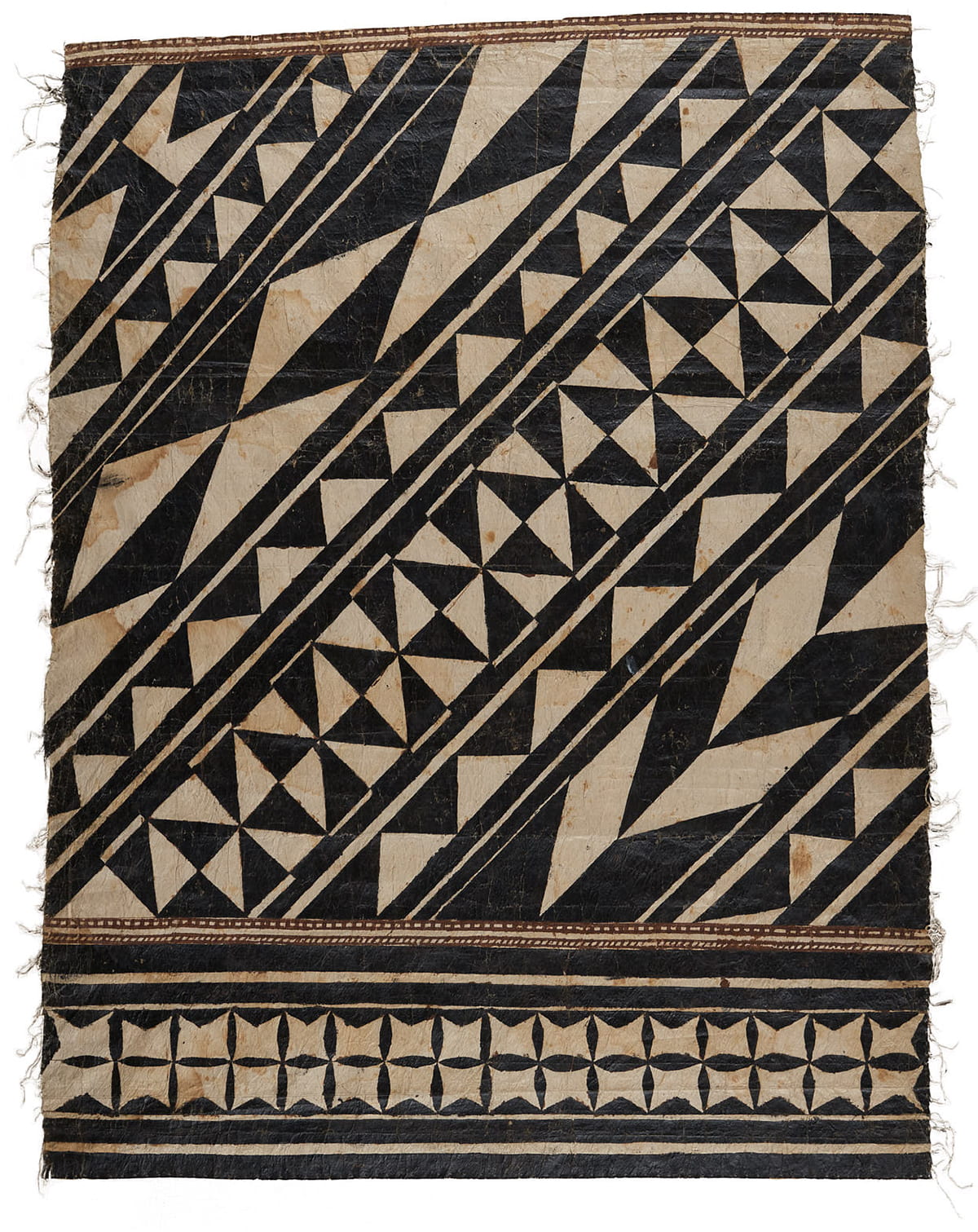 Rectangular cloth with geometric patterning in black and off-white