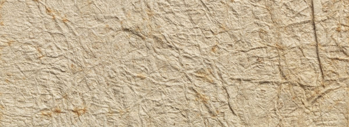 Detail of off-white fibers of a tapa fragment.